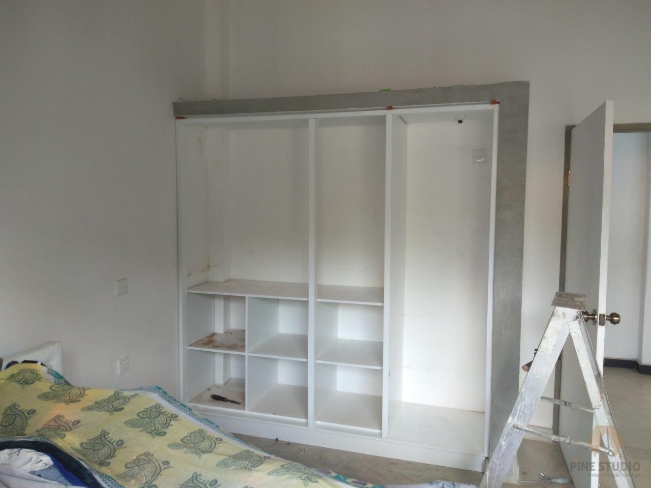 elegant-white-wall-mounted-custom-made-wardrobe-almirah-almari-almera