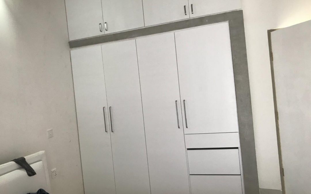 Elegant White wall mounted custom made wardrobe Almirah, Almari, Almera, Cupboard made bt the pine studio sri lanka
