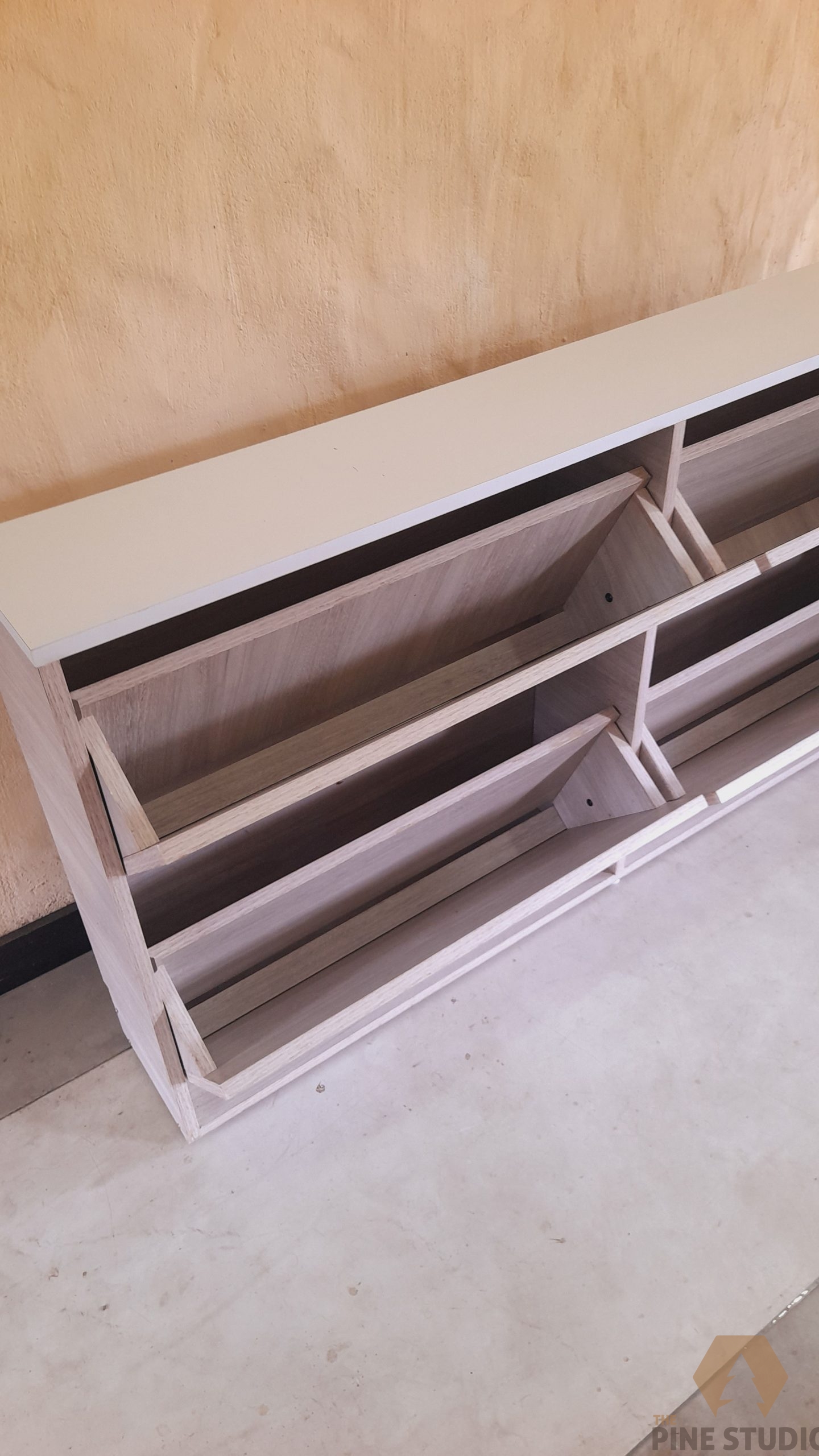 wall-mounted-shoe-racks-made-out-of-melamine-single-layer-non-machanical/