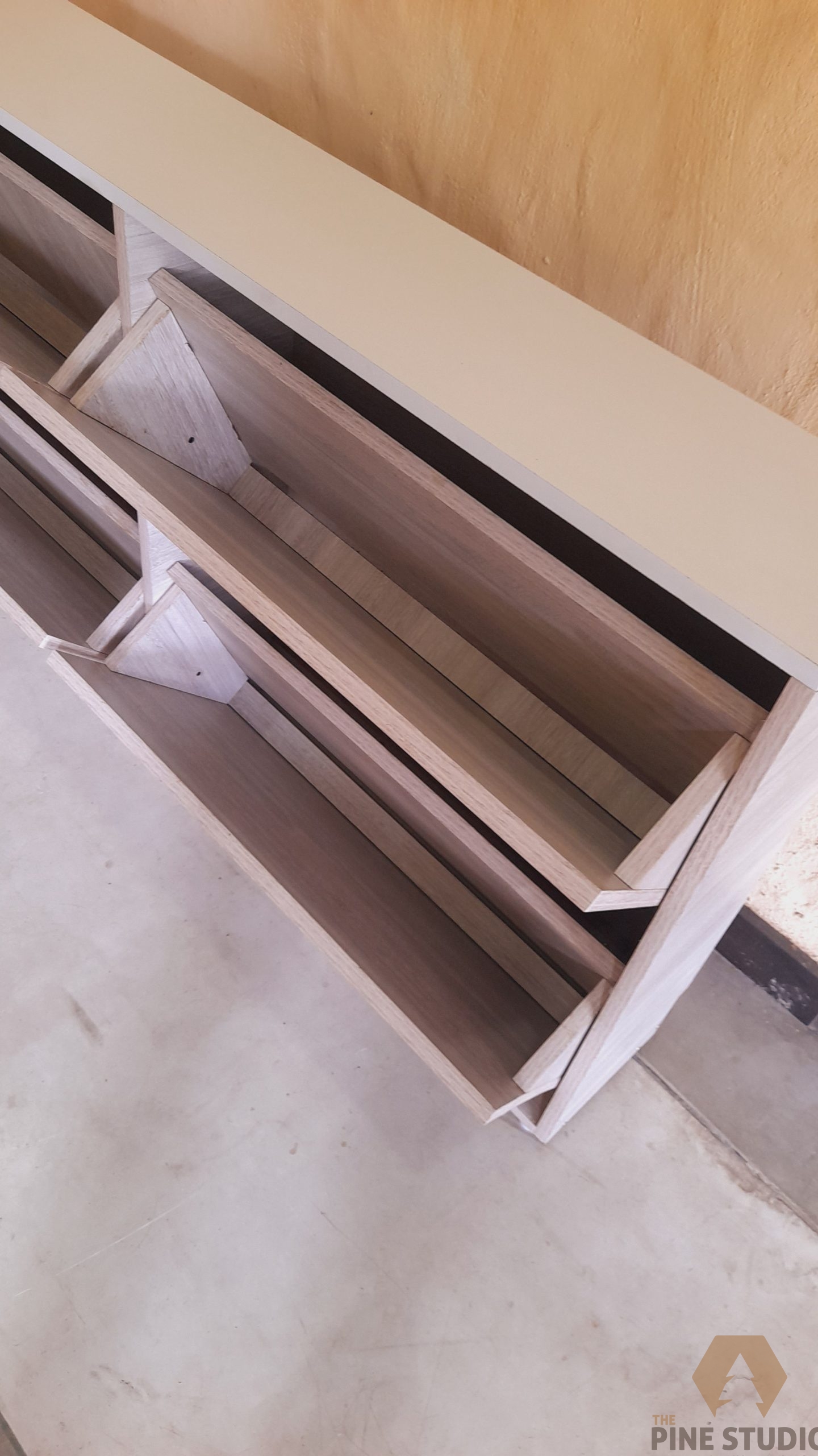 wall-mounted-shoe-racks-made-out-of-melamine-single-layer-non-machanical/