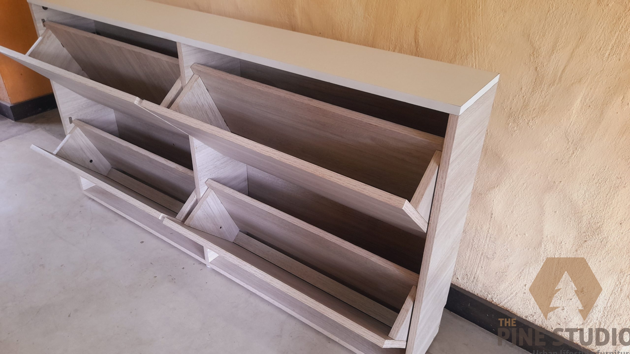 wall-mounted-shoe-racks-made-out-of-melamine-single-layer-non-machanical/